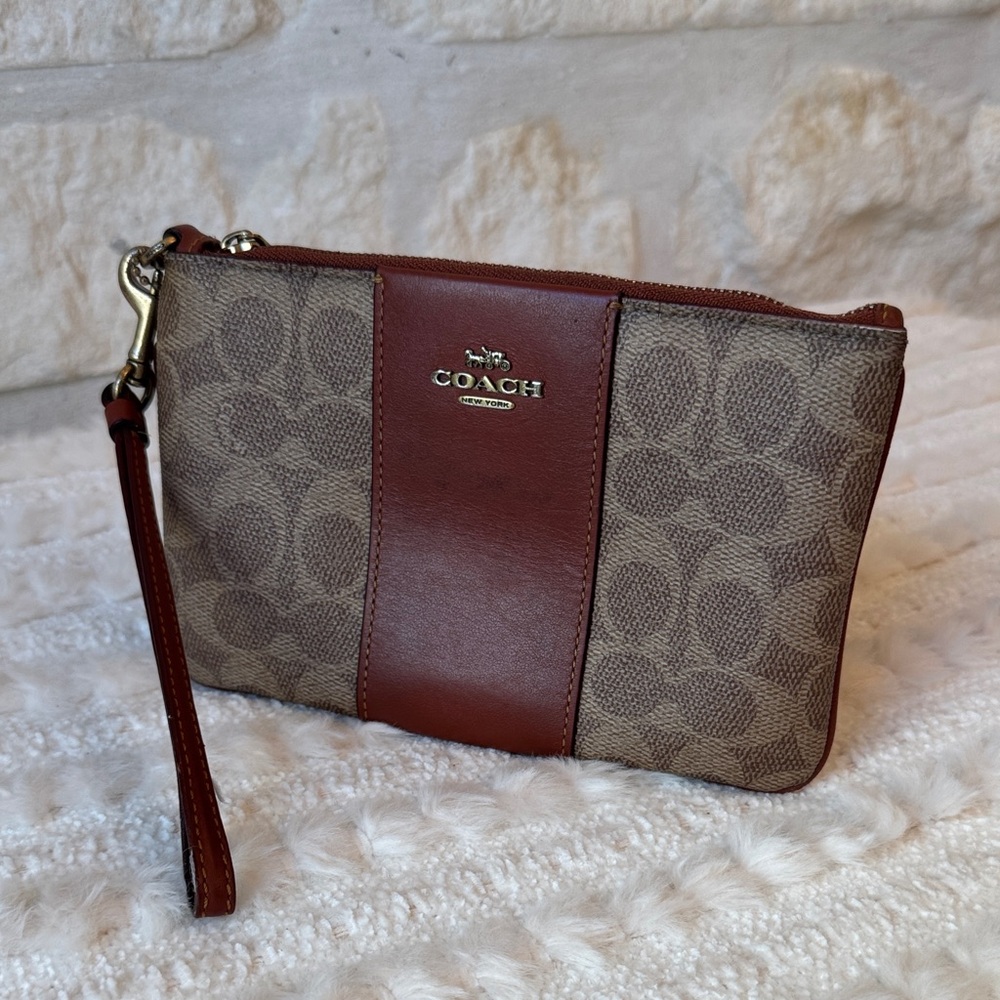 Coach Brown and Tan Signature Clutch